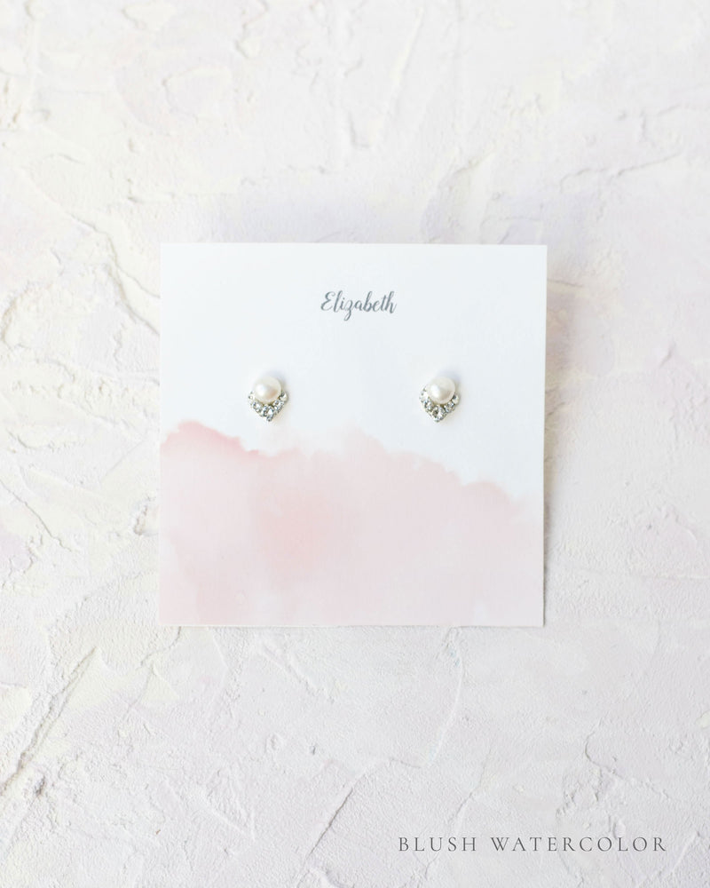 Flatlay of a custom jewellery insert option for our Luxe Gift Wrapping; blush watercolor.