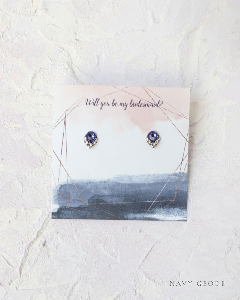 Flatlay of a custom jewellery insert option for our Luxe Gift Wrapping; navy geode.