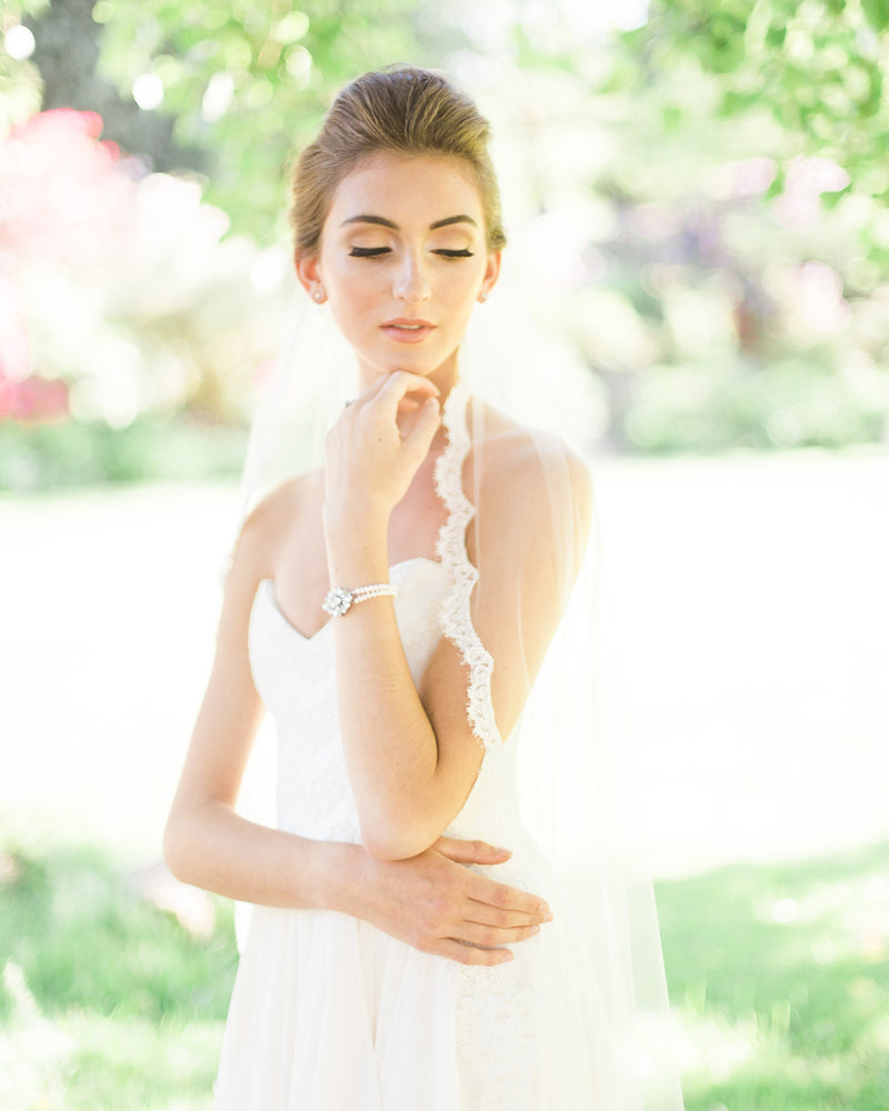 model wearing magnolia short lace veil