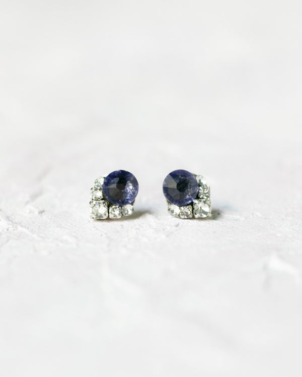 A close-up view of the Celestial Crystal Cluster Earrings in petite size, shown in silver with tanzanite crystal centres.