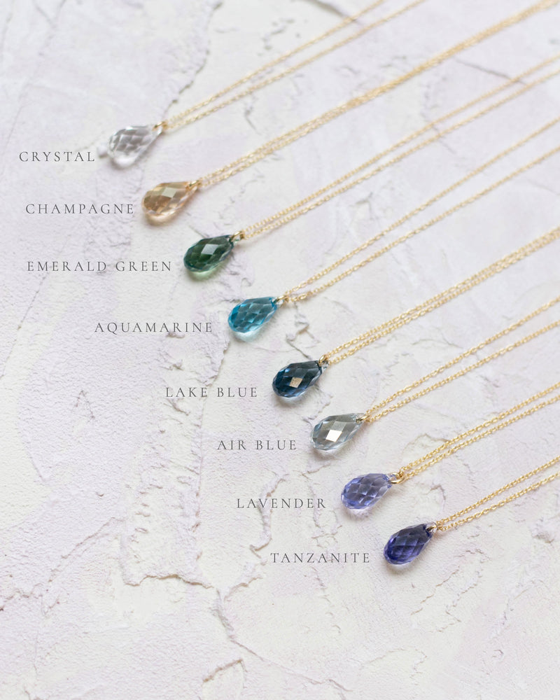 Side-by-side comparison of the 8 crystals that the Dewdrop Necklace is available in.