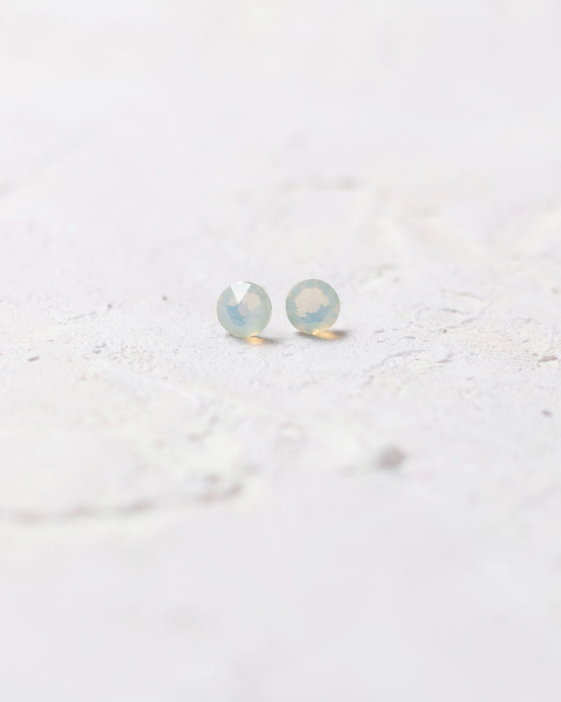 Close product view of the Starry Eyed Bridesmaid Earrings in white opal crystal.