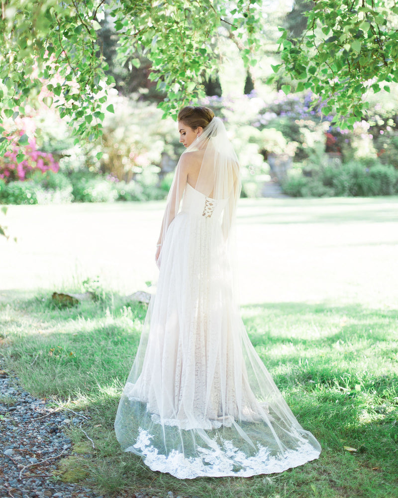Model wearing Whispering Roses Beaded Lace long wedding veil