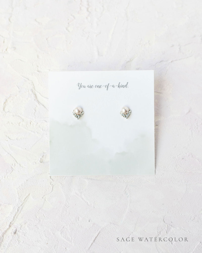 Flatlay of a custom jewellery insert option for our Luxe Gift Wrapping; sage watercolor.
