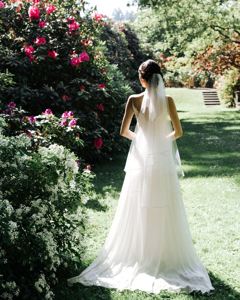 Model wearing Calla bridal veil, wedding hair accessories