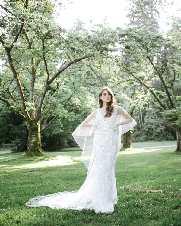 model wearing Cascading Leaves long tulle bridal cape 