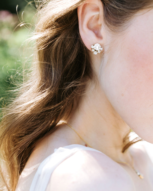 A close view on model of the Celestial Crystal Stud Earrings.