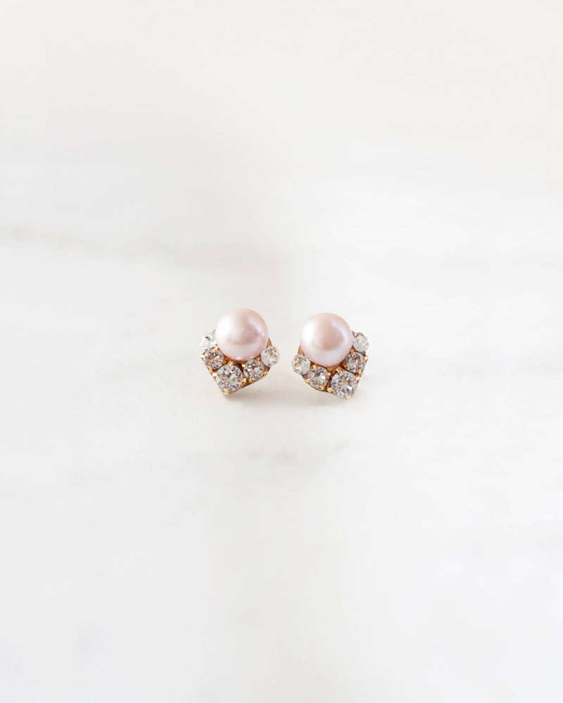 A close product view of the Celestial Pearl Cluster Earrings with blush freshwater pearls in gold.