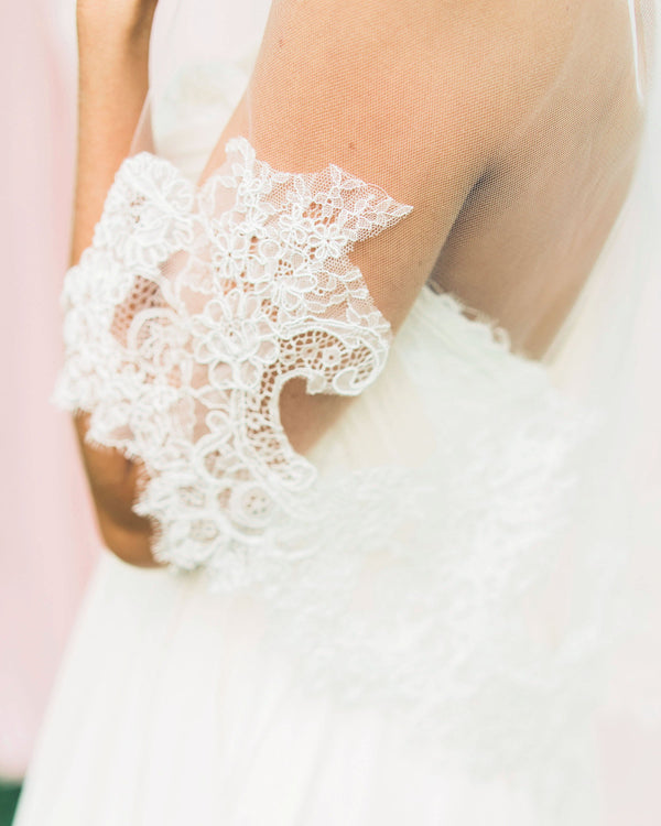 Close-up of the lace edge on the waist length Delicate Chantilly Lace Veil.