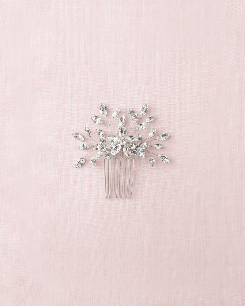 Flatlay of the Delicate Comb in all crystal and silver.