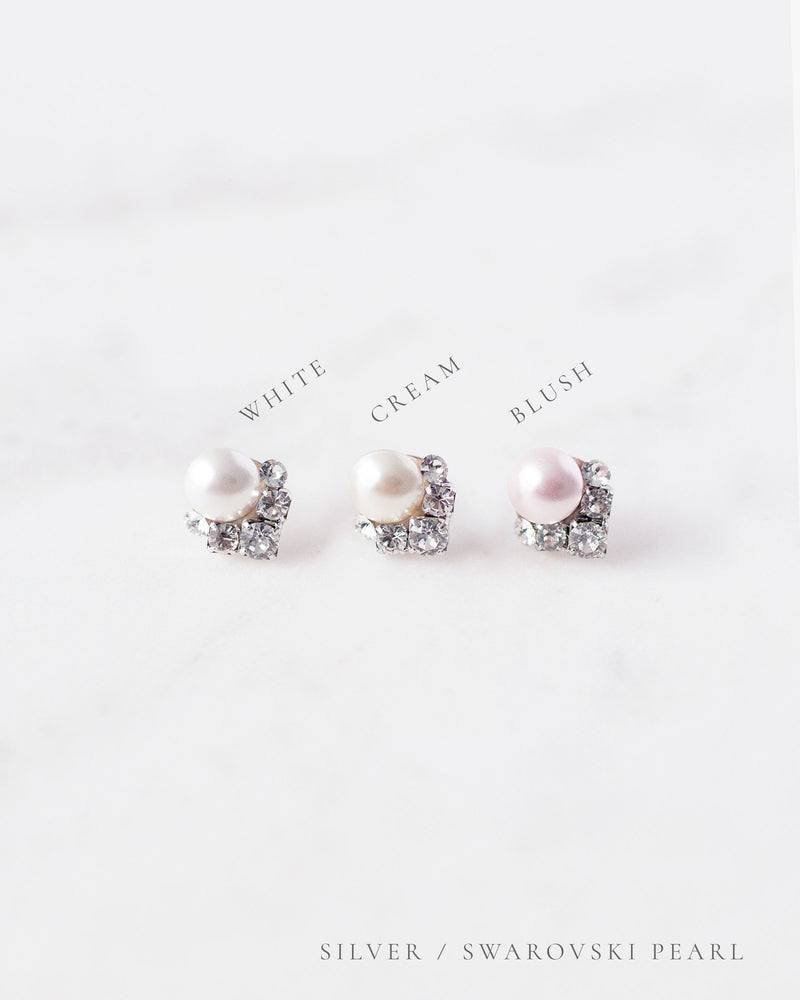 A side-by-side view of the faux pearl color options, all shown with silver settings.