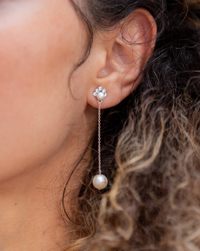 Close model view of the Moondrop Pearl Long Earrings in silver.