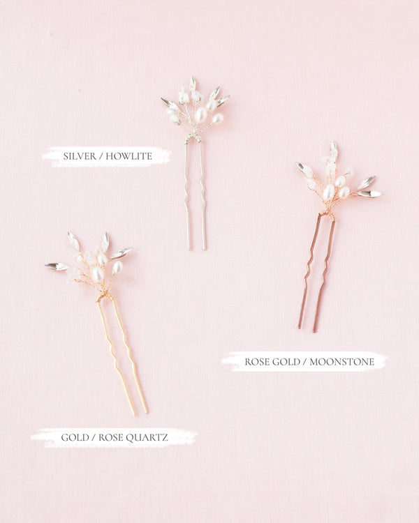 Flatlay of the three colors available in the Sea Mist Bridal Hair Pins; shown in gold/rose quartz, silver/howlite, rose gold/moonstone.