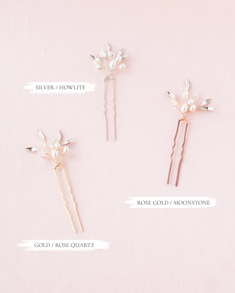 Flatlay of the three colors available in the Sea Mist Bridal Hair Pins; shown in gold/rose quartz, silver/howlite, rose gold/moonstone.