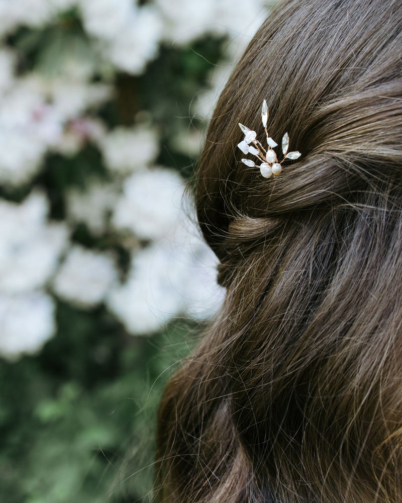 Close on model view of the Sea Mist Bridal Hair Pin.