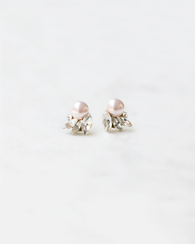 Close product view of the Starlight Pearl & Crystal Bridal Stud Earrings in gold with blush pearls.